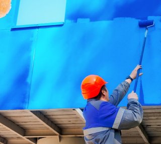 Imagen de persona pintando